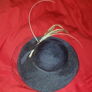 Ruth Alan Designs hat with feather